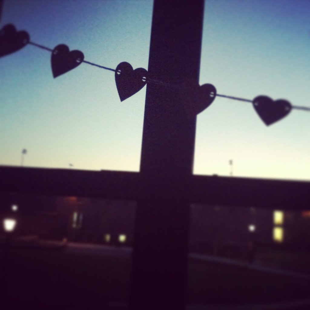 The heart garland my mom made hanging in front of my window on a beautiful night (: