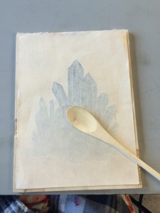 Hand printing using a spoon for pressure