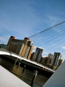 The Gateshead Millennium Bridge is a tilt suspension bridge that literally rotates up to let boats under. SO COOL!