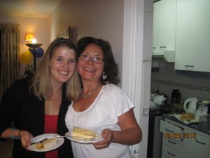 me and my host mom Gladys enjoying the cake 