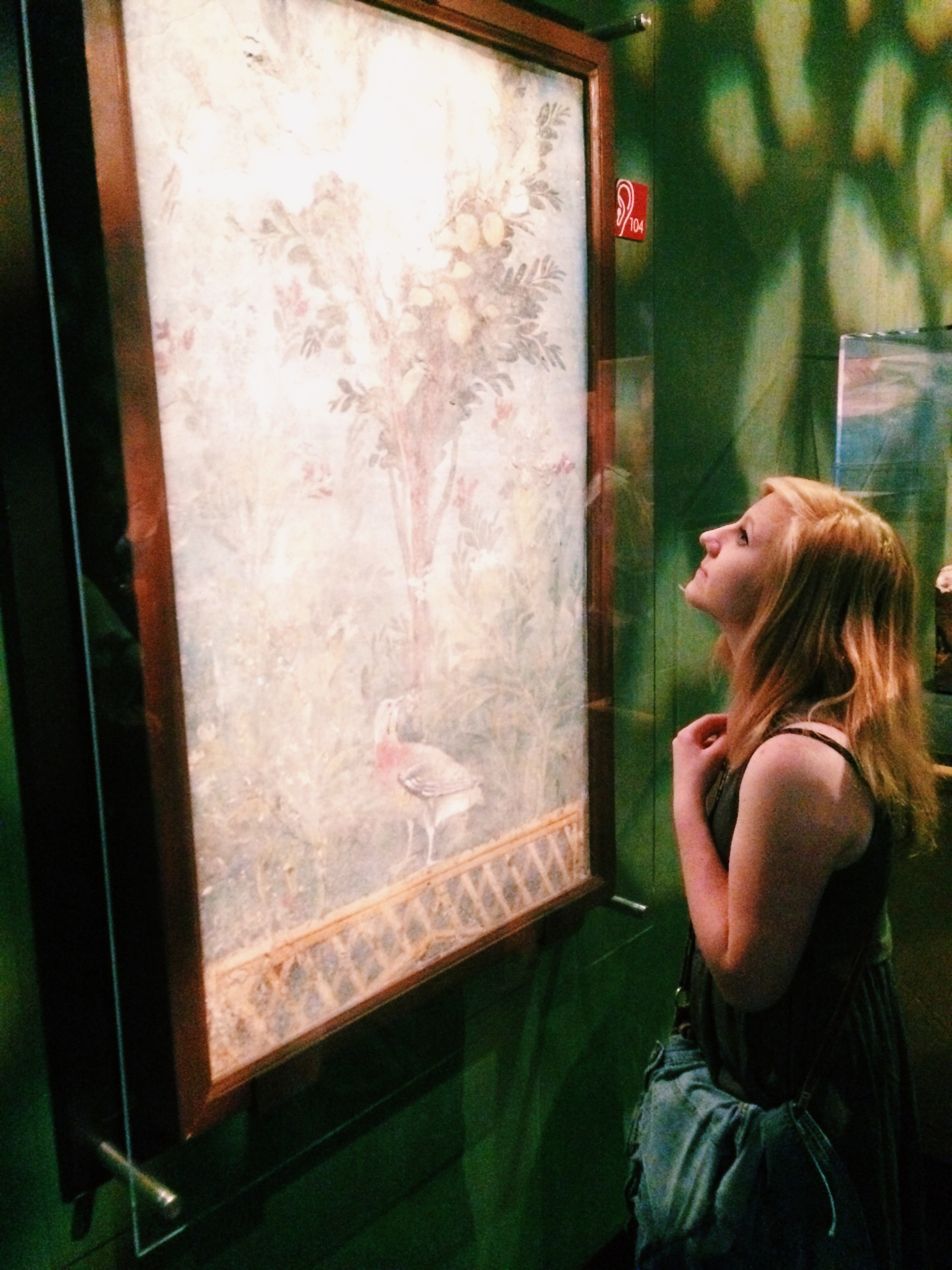 Marissa Irish'16 admiring a fresco fragment