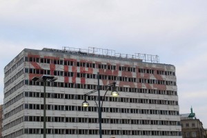 A building in Berlin where someone painted an interesting message.